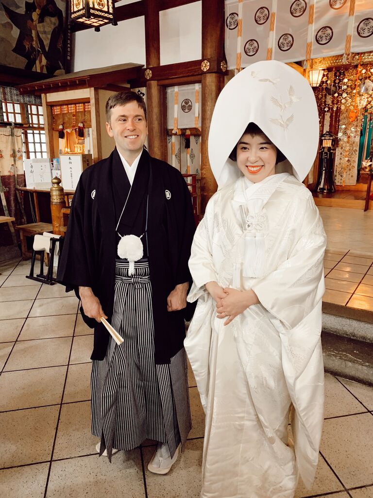 Bride and groom in traditional Japanese wedding attire