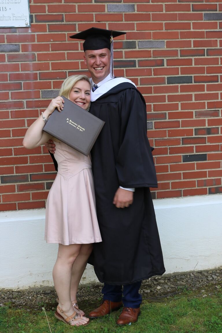 Kyle's college graduation from St. Bonaventure University. 

After graduation, Kyle and Darienne would move in together with Darienne's uncles and work at their restaurant in Geneva, NY for the summer while Kyle applied for police opportunities. 