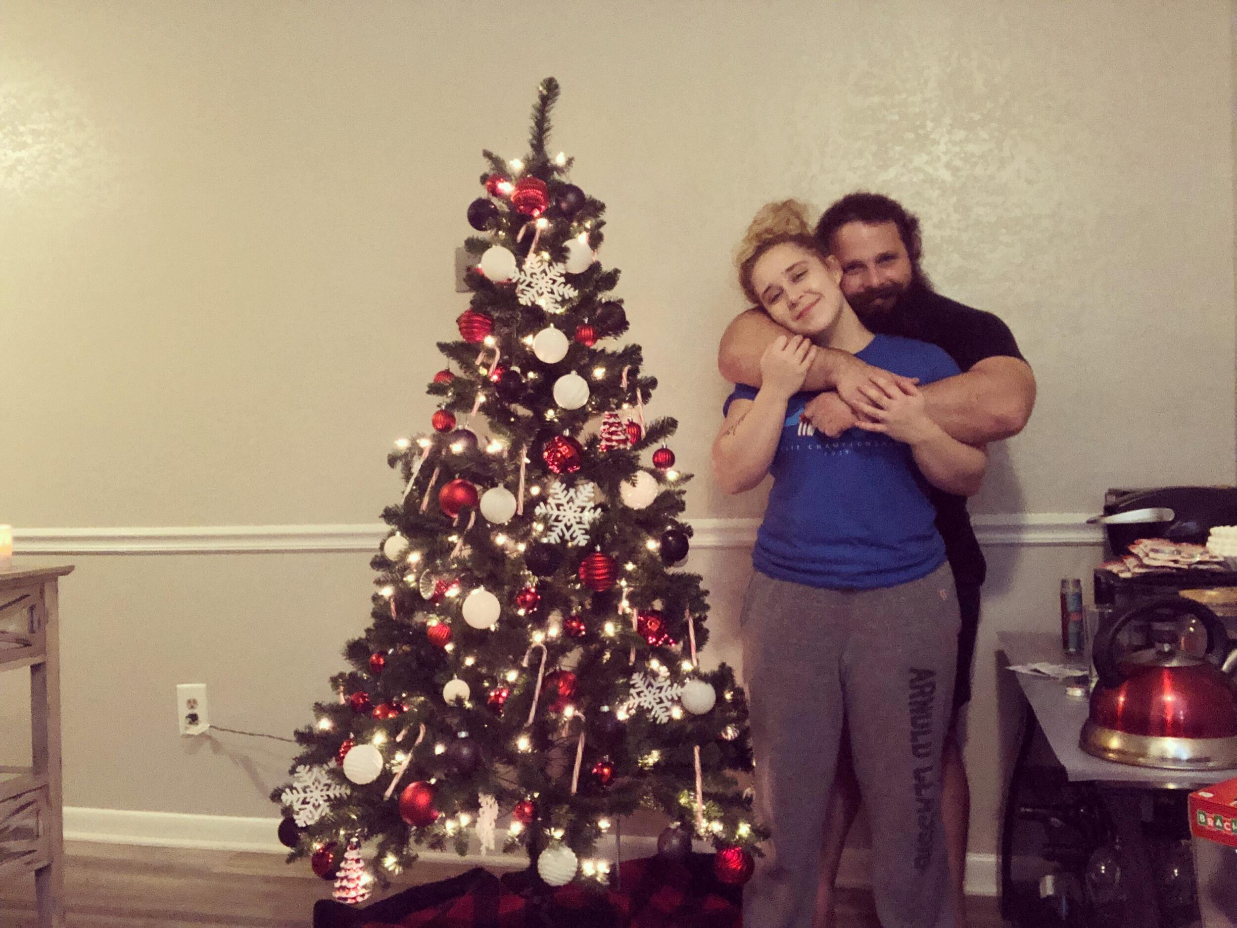 our first Christmas in our first apartment together! the tree was munchkin size, just like us!
