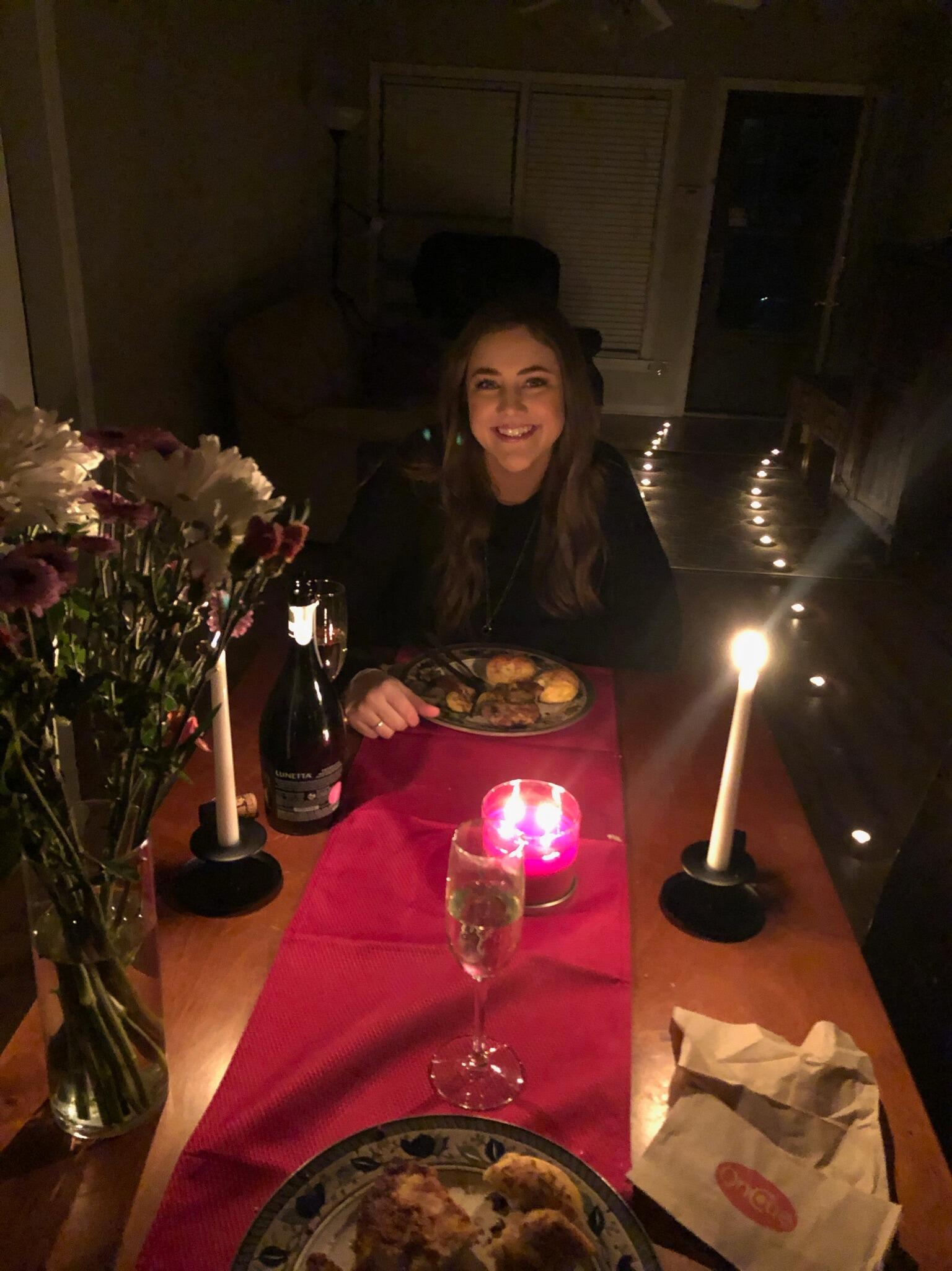 Our first New Years Kiss! Ian went all out on the romance, with candles, homemade chicken parm, garlic knots, and Oncue napkins!