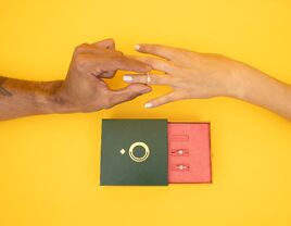 Couple trying on temporary engagement ring 