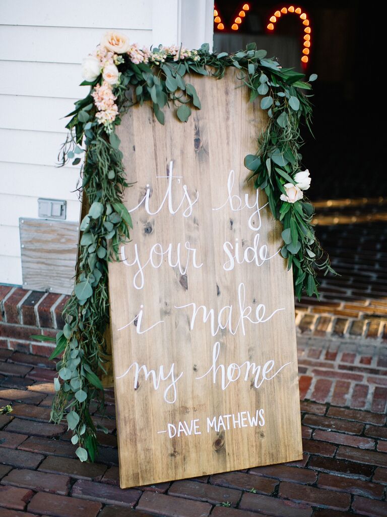 wedding sign quotes wood with white calligraphy and greenery