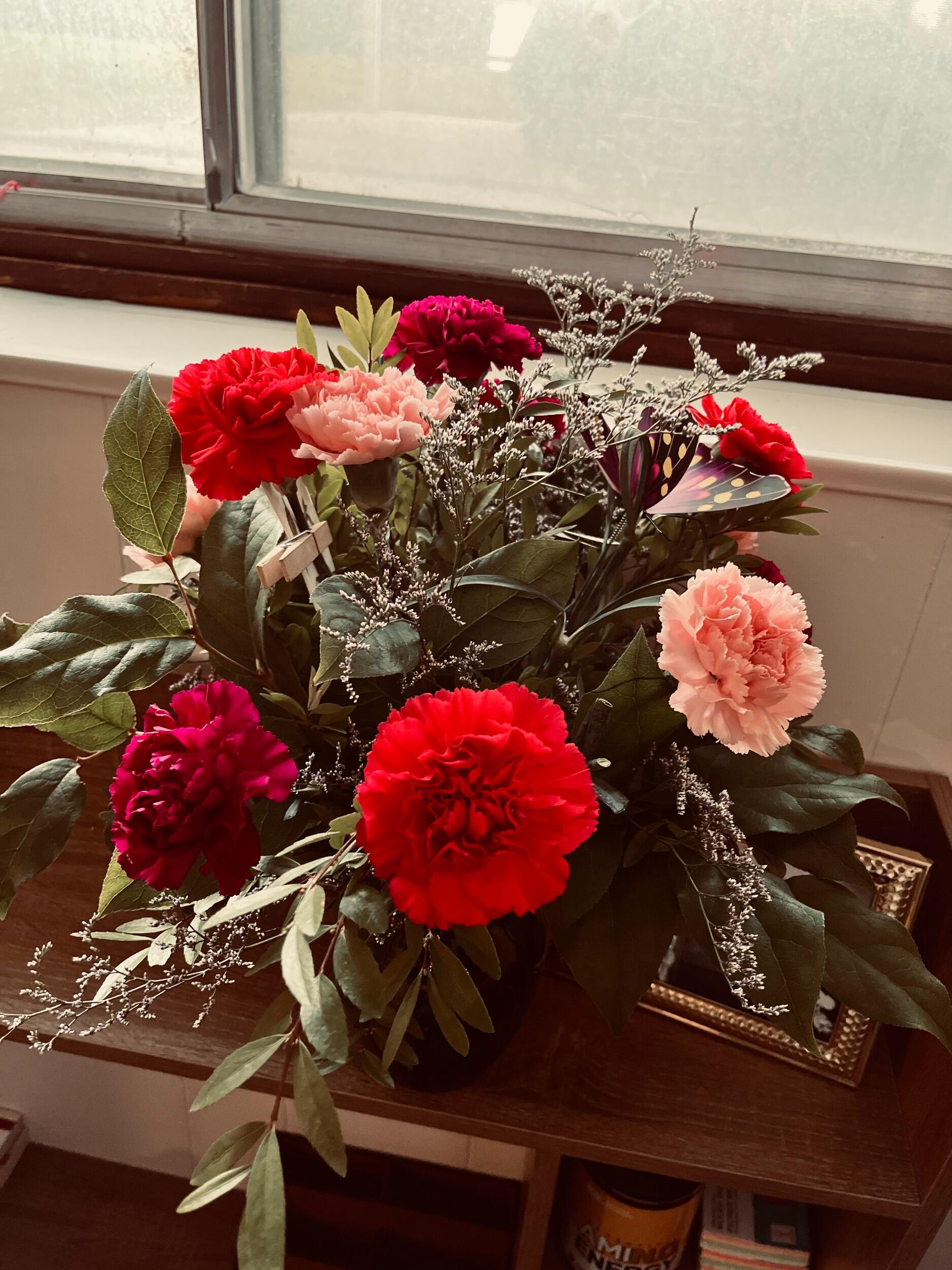 The day it became official! Bailey secretly asked Lexi's best friend, Abi, what her favourite flowers were so he could show up with them at her door and ask her to be his girlfriend. 