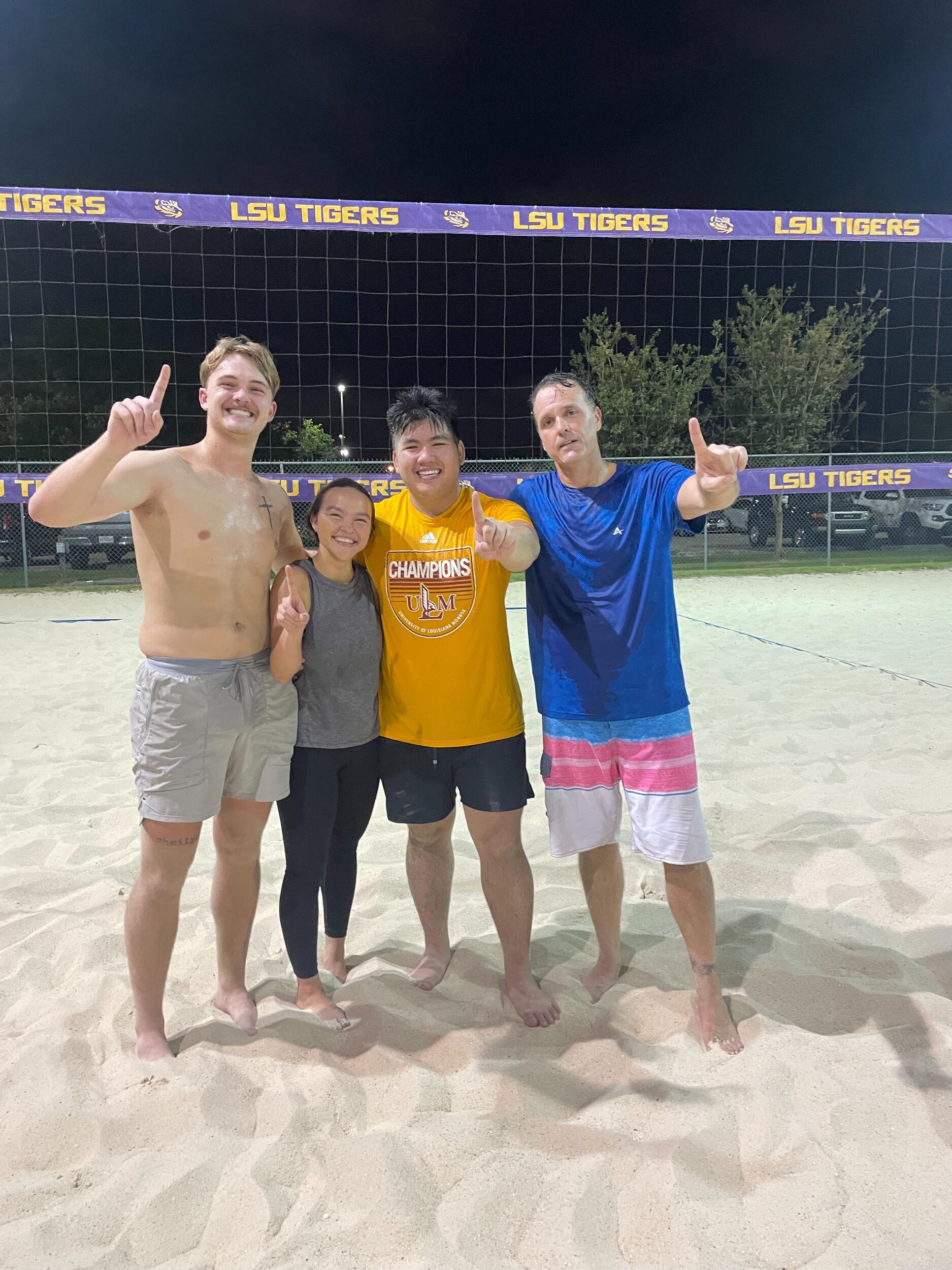 Mallory & David win first place in their division of sand volleyball!