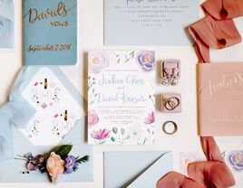 pastel wedding invitations and vow books