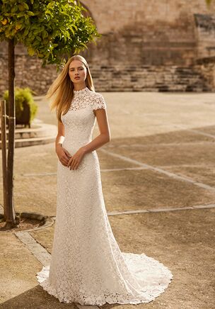 Straight silhouette wedding dress in textured satin with square neckline, straps and low-cut back. Includes lace overdress.