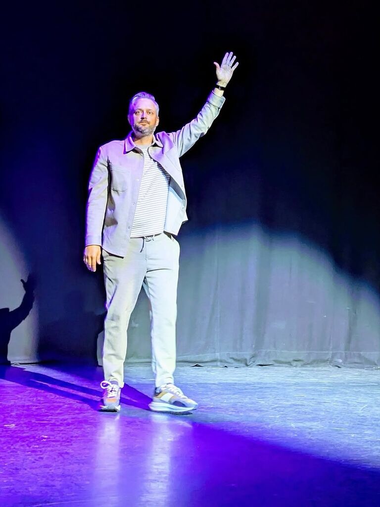 Nate Bargatze performing on his Big Dumb Eyes world tour
