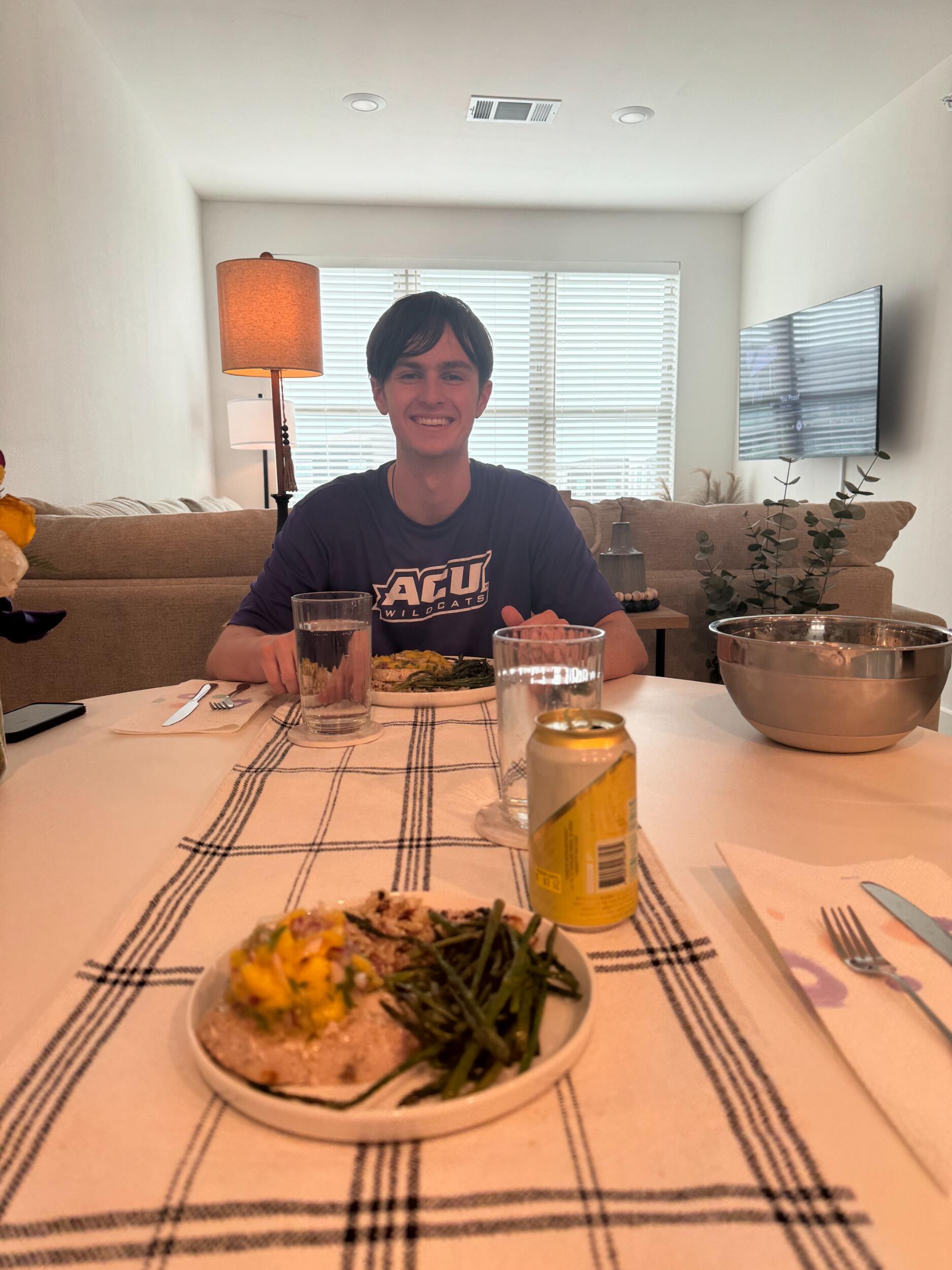 Tyler and Alli's first dinner in her new apartment in Fort Worth! On the menu was mago-salsa swordfish and garlic green beans.
