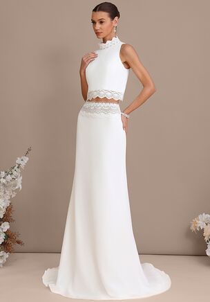 Fall in love with the JJ's House Sacha A-line High Neck Lace Wedding Dress! A timeless and elegant design crafted to make your dream wedding a reality. Shine with confidence as you walk down the aisle.
