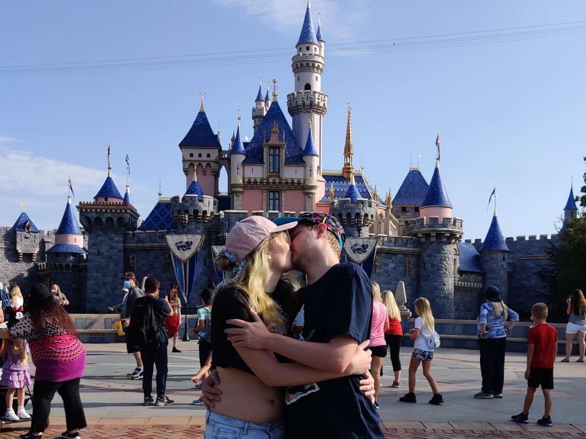 Our first Disneyland trip together in front of Sleeping Beauty castle