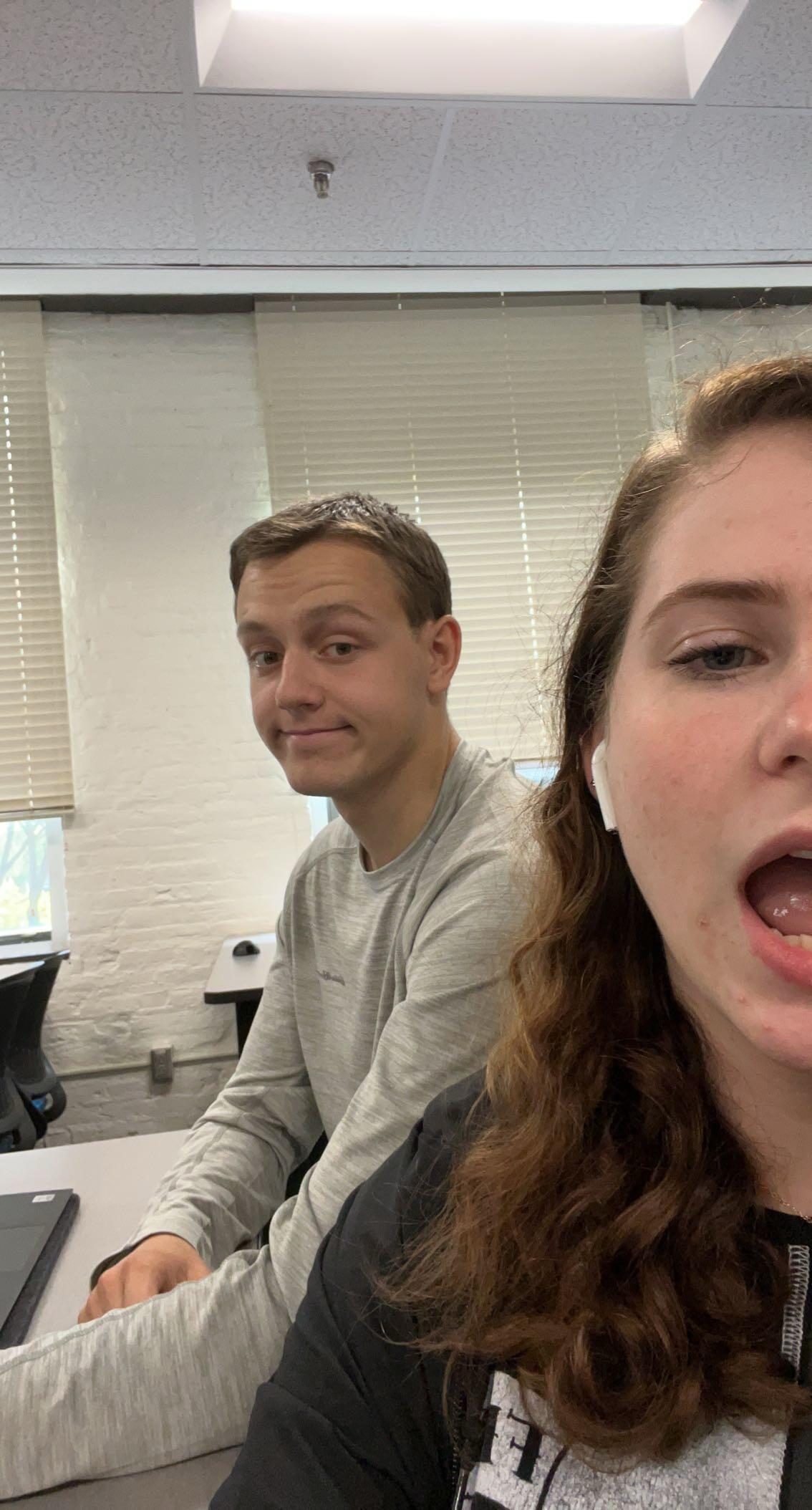 Our story began the day that we met in our Old Testament class in August 2022. Lily was being super silly in class and joking around with the professor, and somehow, John found this very appealing. He came up to her after class and asked to sit with her next time, and that's where we got started! We were friends for a few months and then started the "talking" stage in October. This was our first picture together! 
I know, it's pretty silly!