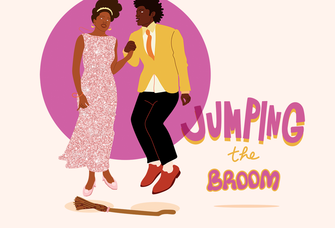 couple jumping the broom wedding ceremony