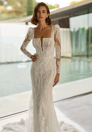 Mermaid lace wedding dress with square neckline, open back and zipper. Detachable long lace sleeves and beadwork on the bodice.