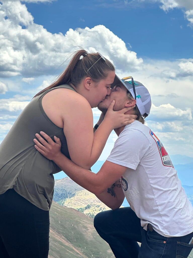 We were going up Pike's Peak on our family vacation thinking it was just another tourist attraction to see. But then Cory got on one knee and of course had to say yes!