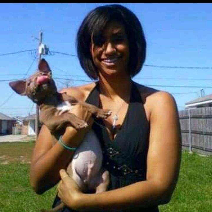 Jasmine in New Orleans with our first fur baby. 