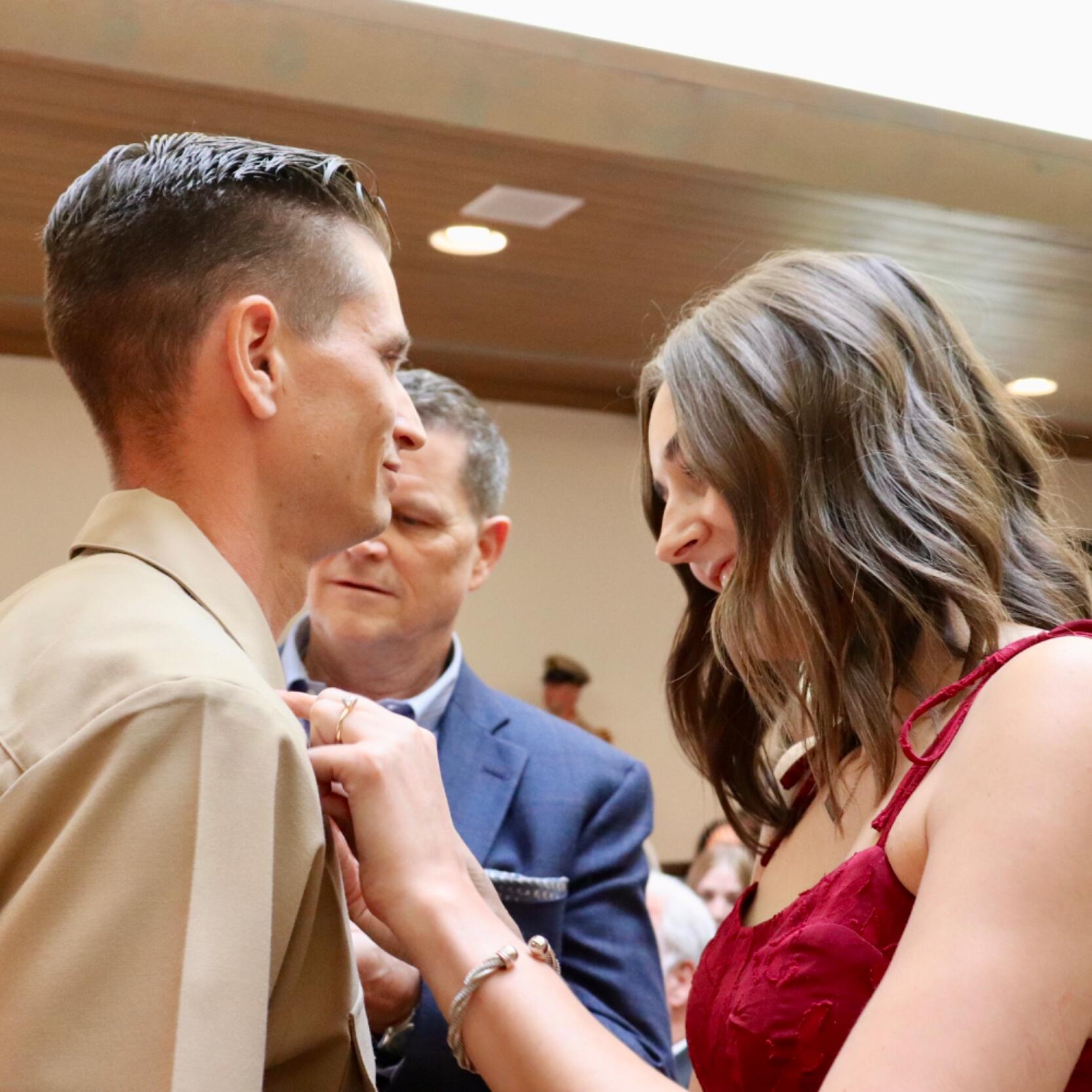Pinning Callaway as a Navy Chief after a long six weeks of season.
