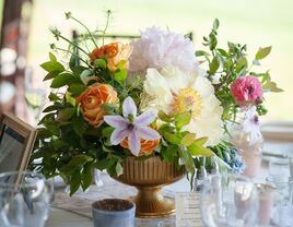 Orange Pink Yellow Flowers in Gold Pedestal Centerpiece