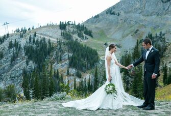 wedding couple in wyoming mountains