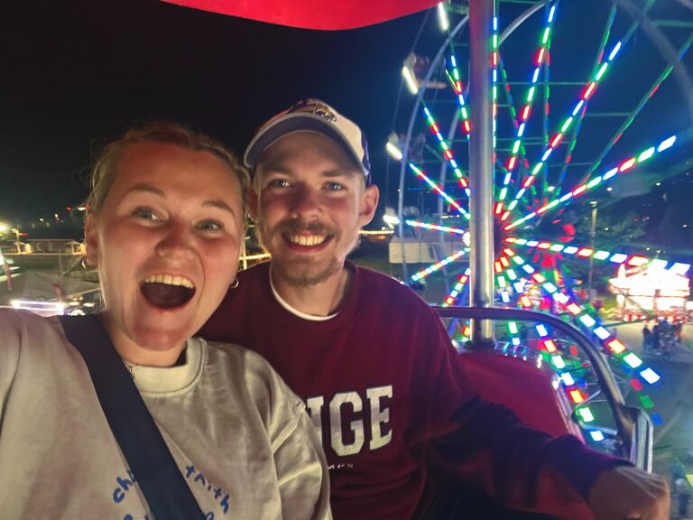 Trip to the Asheville Fair with friends, and Crystian riding a Ferris wheel (even though he hates heights!)