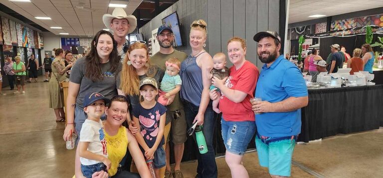 Getting Lee used to a large crowd. Only some of the Olsen siblings and family at the South Dakota State Fair.