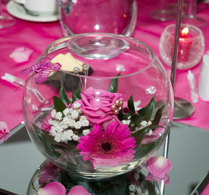 Pink Flowers In Fishbowl Vases