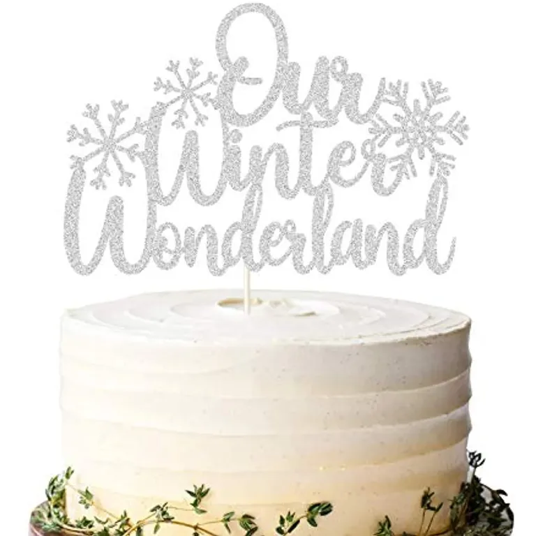 Silver 'Our winter wonderland' Christmas engagement party cake topper