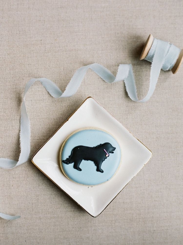 sugar cookie wedding favor with dog-themed icing