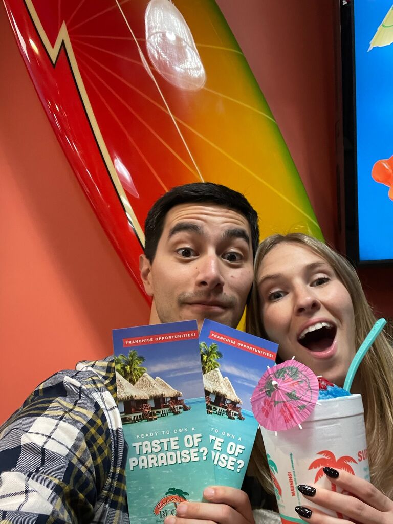 "let's pose like we won a sweepstakes trip to an island" - Adam