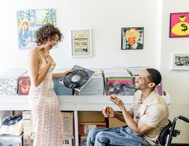 Wedding proposal in vinyl record music store