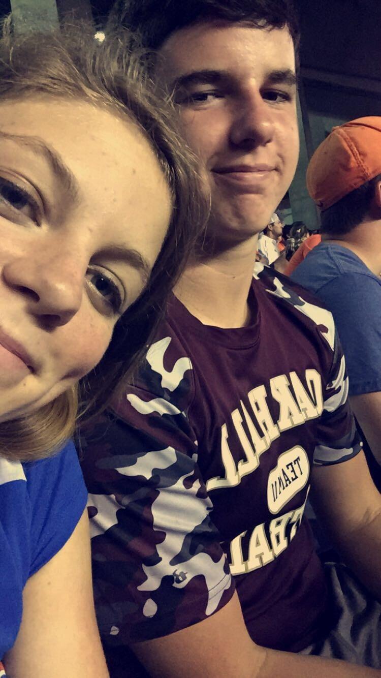 Grayson and Hailey's story began in September 2015!

This photo is the first photo ever taken of the couple. They were on their second date at one of the Florida Gator football games.  