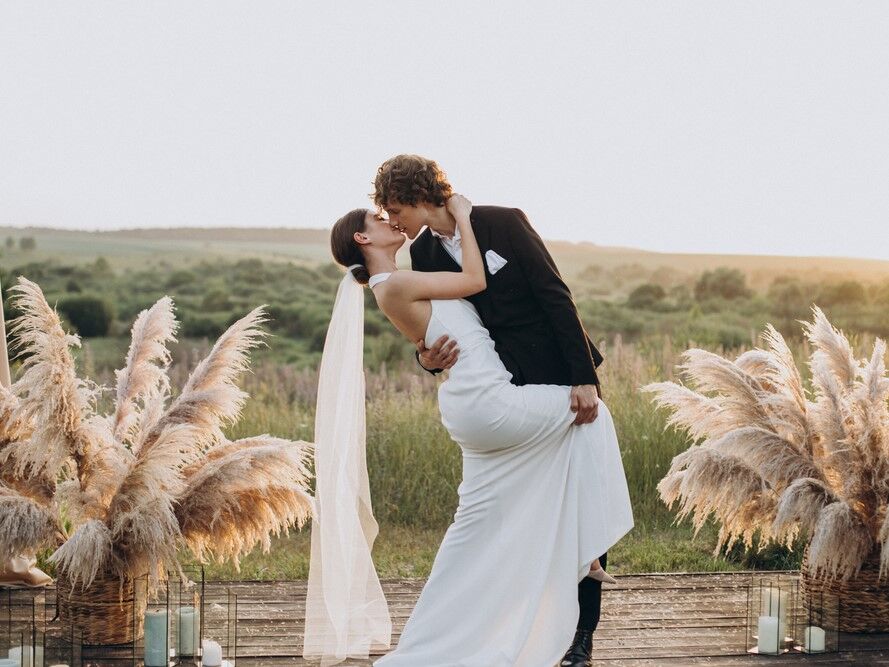 Couple kissing during their ceremony