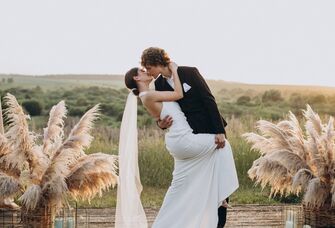 Couple kissing during their ceremony