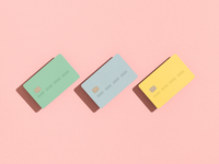 Three credit cards on pink background, does getting married affect your credit score