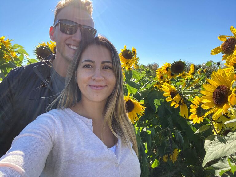 One of John's favorite pictures of Danielle, walking through a sunflower field in Upstate New York. This was the first day that we said the fateful words, "I love you". 