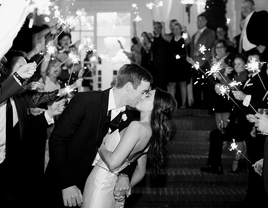 Wedding reception kiss and exit