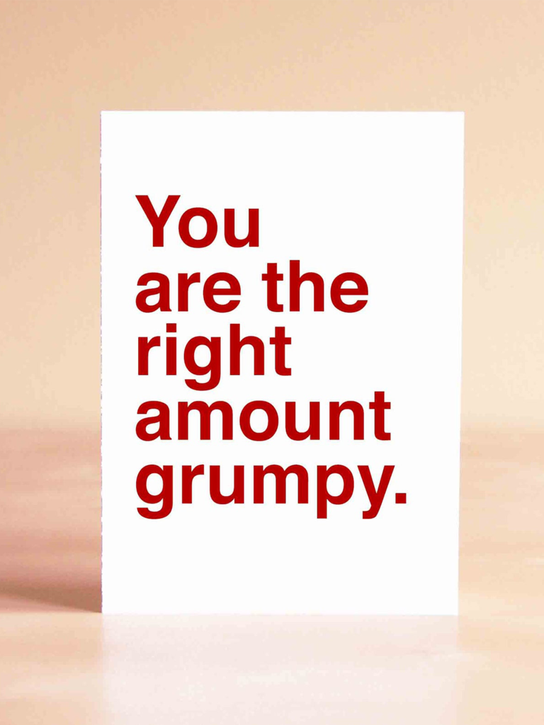 Card with 'You are the right amount grumpy' in simple red type