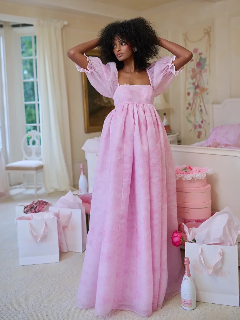 floor length pink dress with puff sleeves