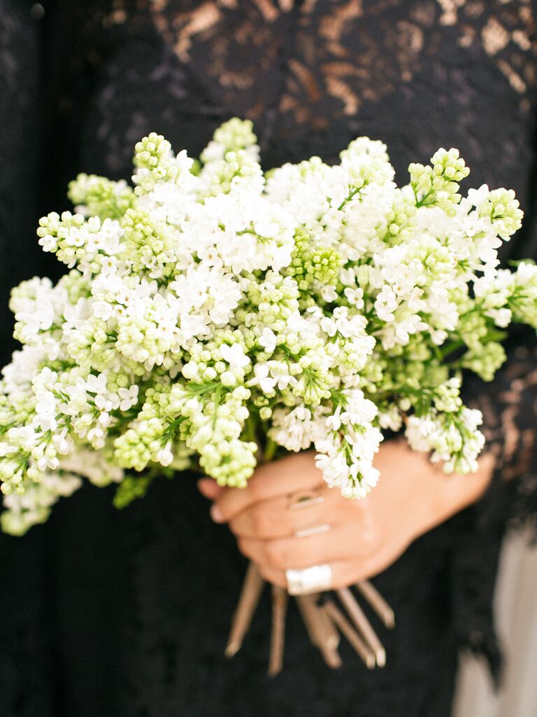 small spring wedding bouquet with white lilacs