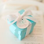 Wedding favor in small blue box with white bow
