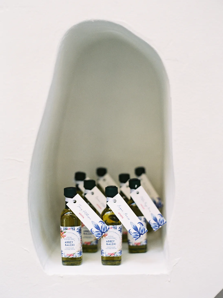 Olive oil bottles used as wedding escort cards