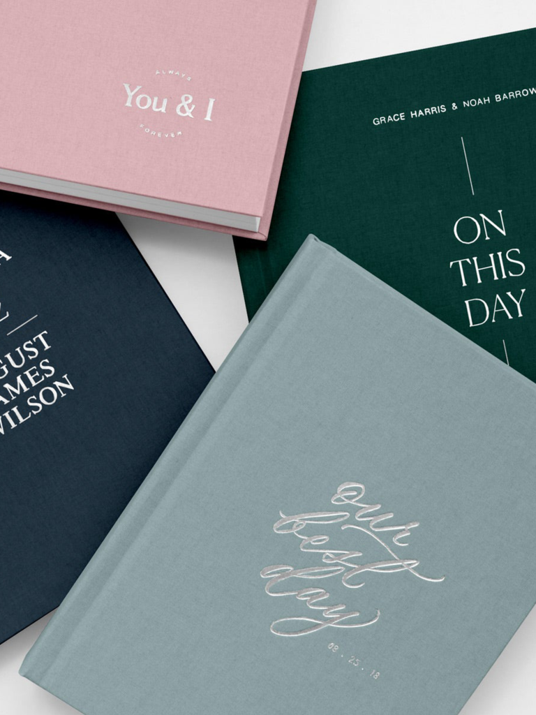 Different color cover designs of wedding photo albums