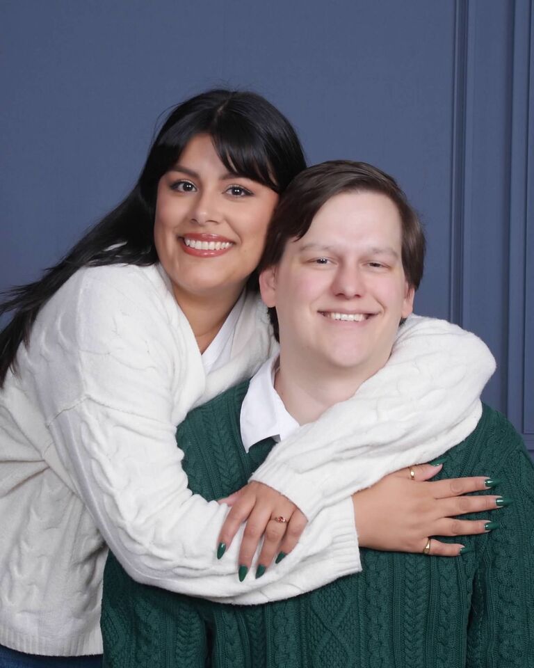 Our first married Christmas Photo! (peep the ring)