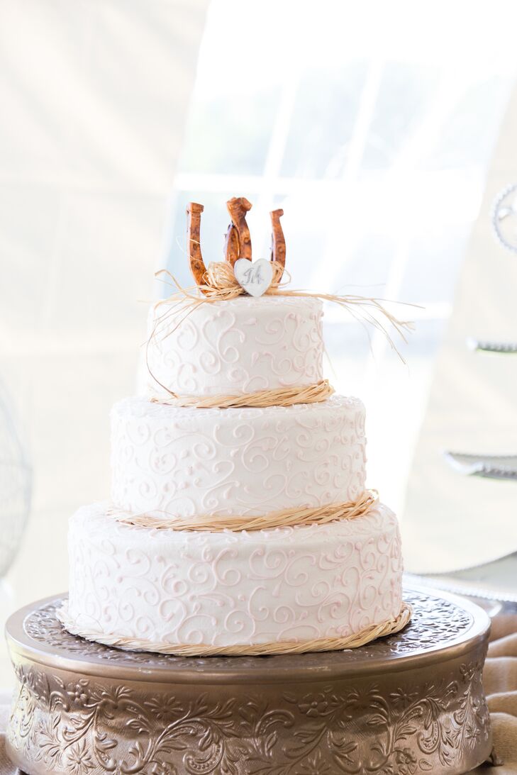 Three Tier Wedding Cake With Horseshoe Cake Topper