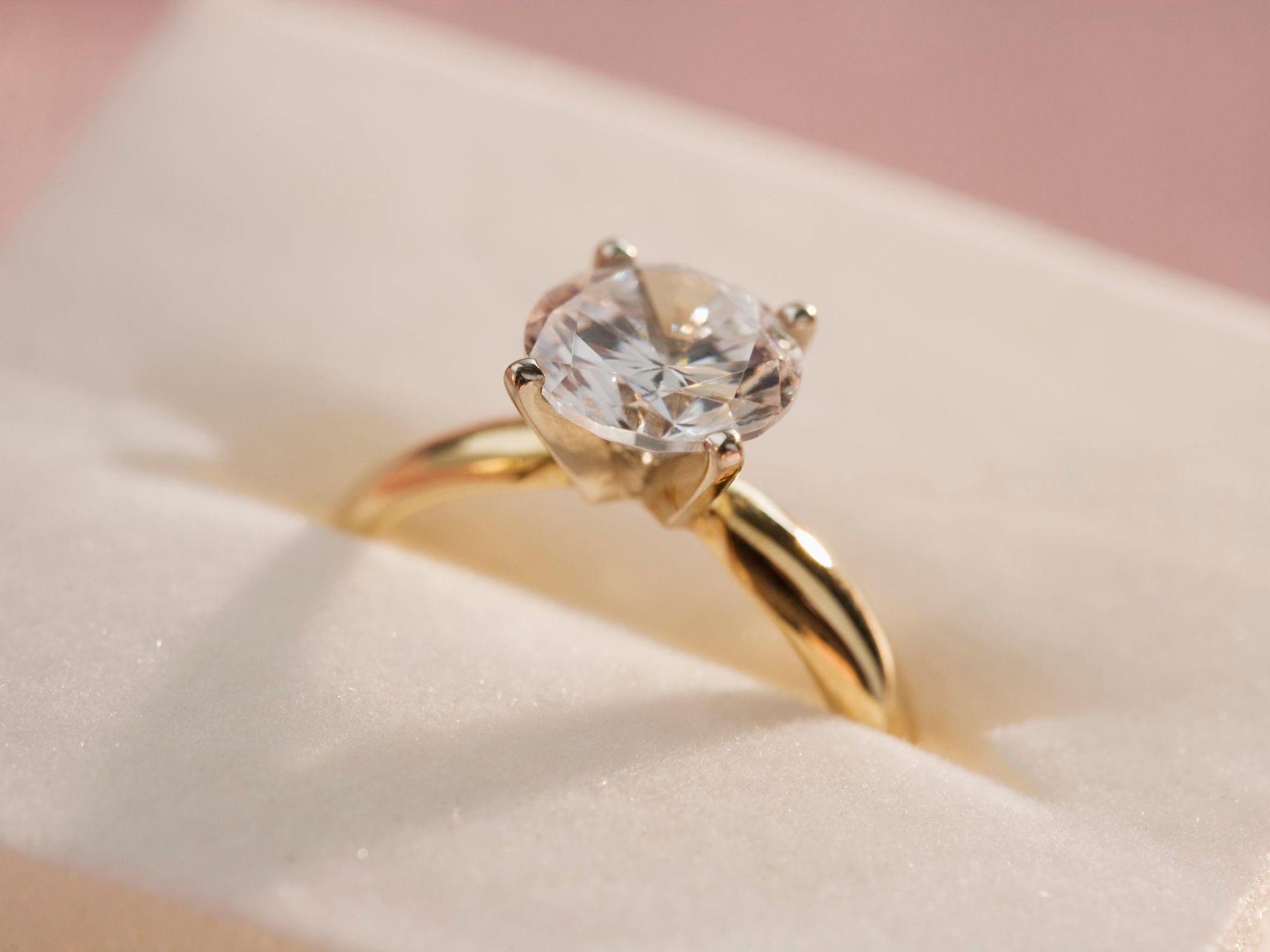 Close up of gold diamond engagement ring