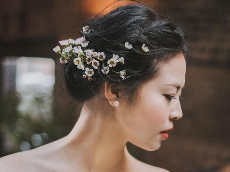 Low updo with flowers