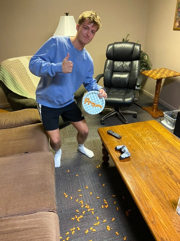 Caleb's epic prom-posal featuring a planned fall, spilled whale crackers, and the famous quote, "Whale you go to prom with me?"