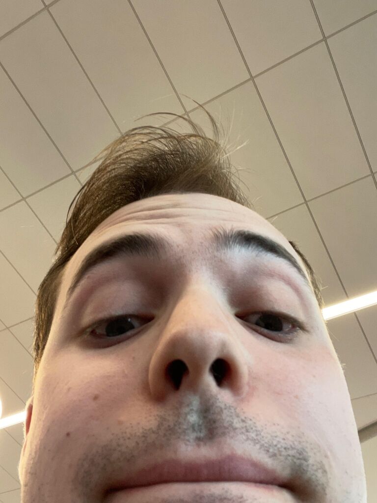 The couple met in LGA airport. Philip Michael took this picture to add to Natalie's phone contacts
