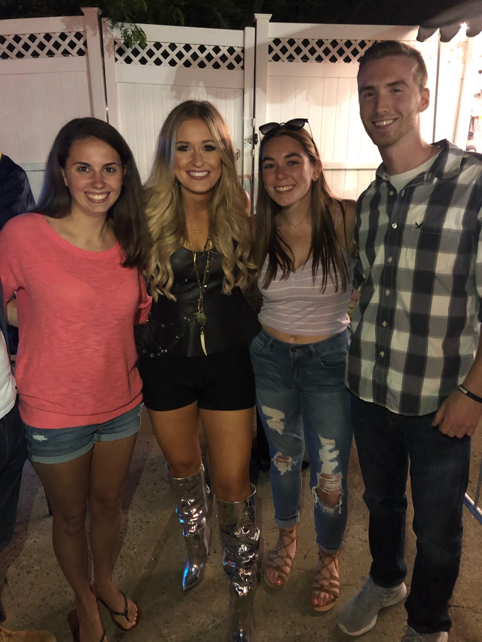 Our first ever concert 5 days after we officially started dating- Rascal Flatts! (They are not pictured, this is the opener person who we still don't know and the photographer cut Brian out of the picture)