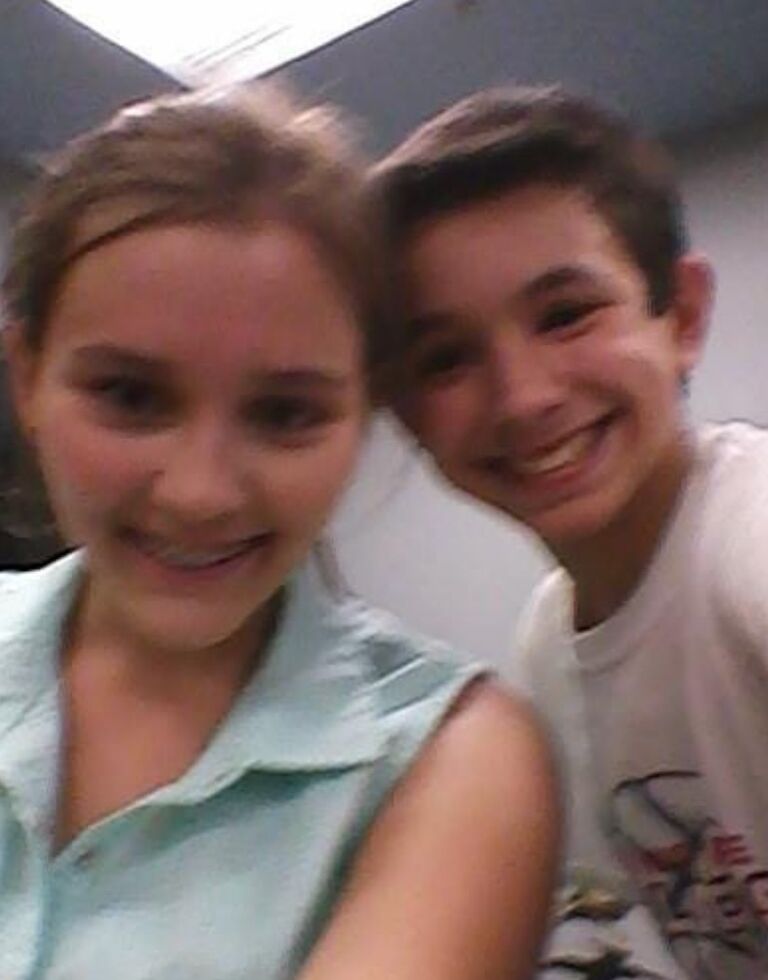 Jeremy and Emily meet for the first time after texting and video chatting for 2 months. They were both just 13.  This is their first picture together. 