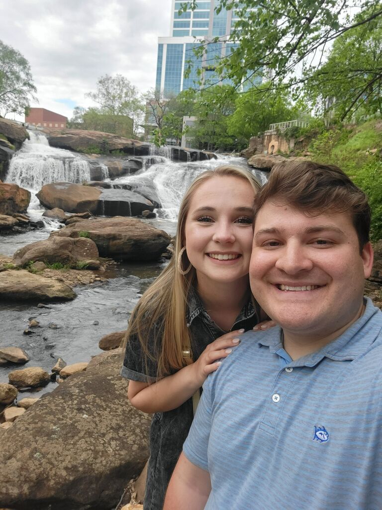 We went on a date to the very same baseball stadium we went to on our first date! Then, Jacob proposed by the falls in Downtown Greenville! 